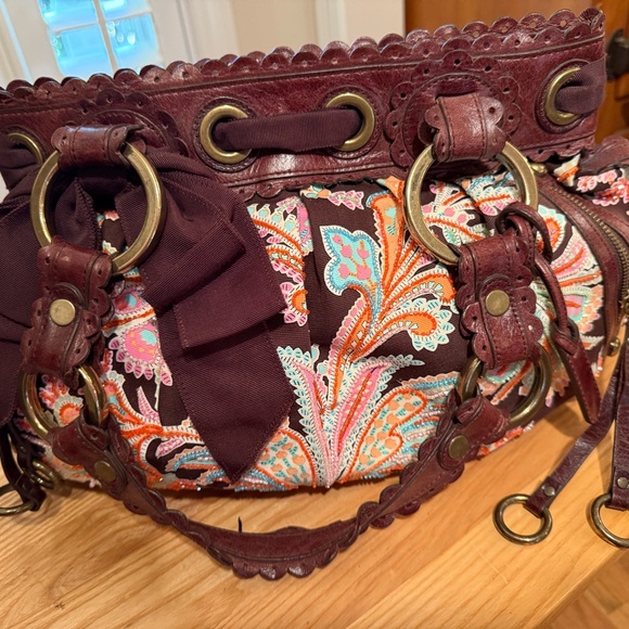 Isabella Fiore gorgeous colors and amazing leather work…detailed beading. - Picture 3 of 7